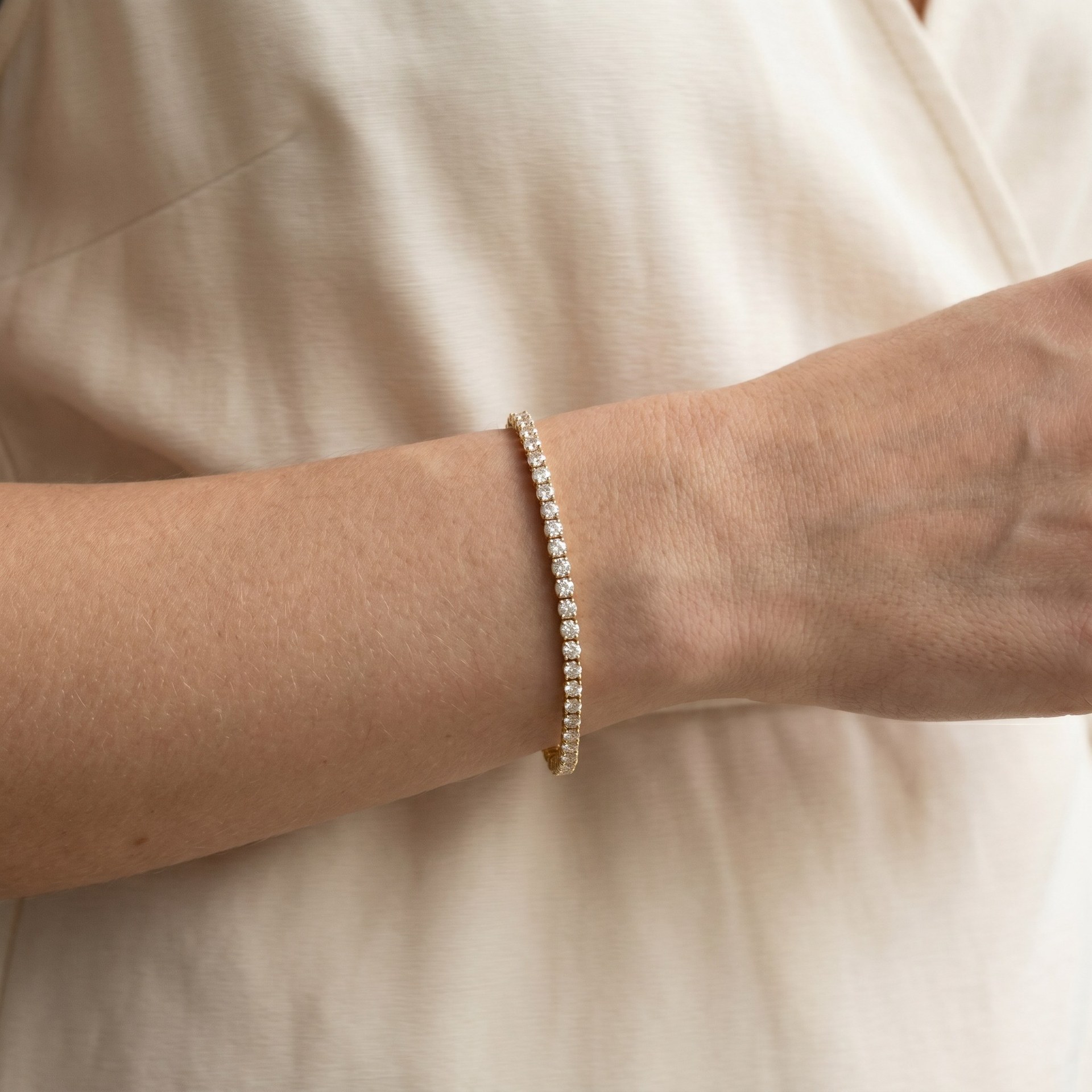 A diamond spinning under studio light, refractions blurring across its facets.